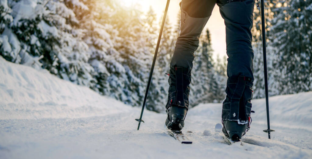 photo of skier's legs facing downhill