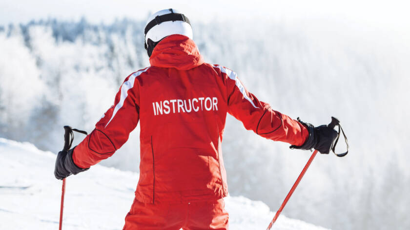 Snow instructor on mountain