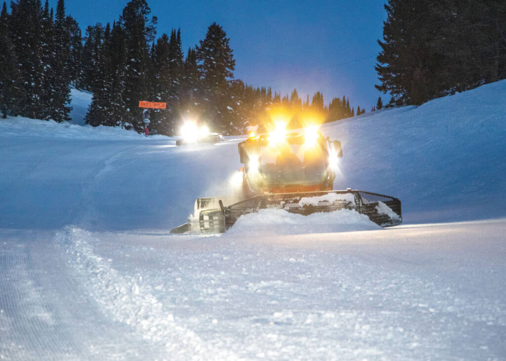 Front view of a Winch Cat grooming machine at night