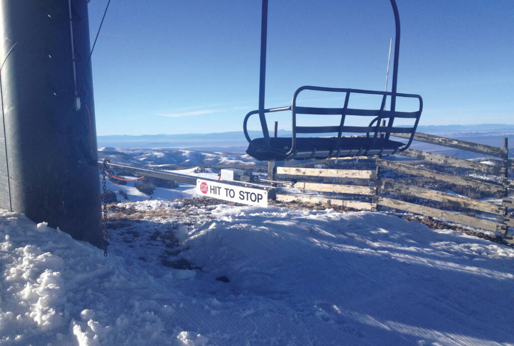 Lift chair with magnetic stop gate in foreground