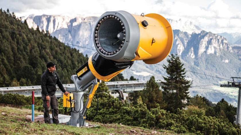 Man operating TechnoAlpin’s TT10 fan gun