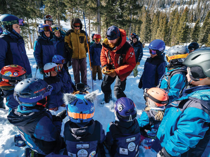 Handing out safety award in a group of skiers