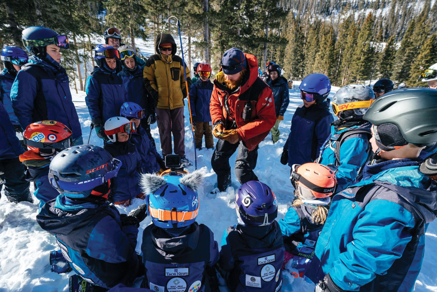 Handing out safety award in a group of skiers