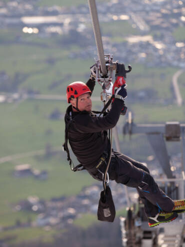 Man wearing climbing protection system