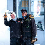Two lift operators mugging for the camera