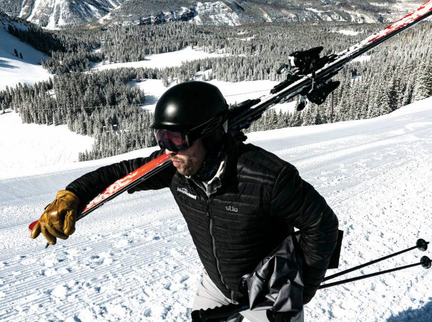 Man trekking across mountain