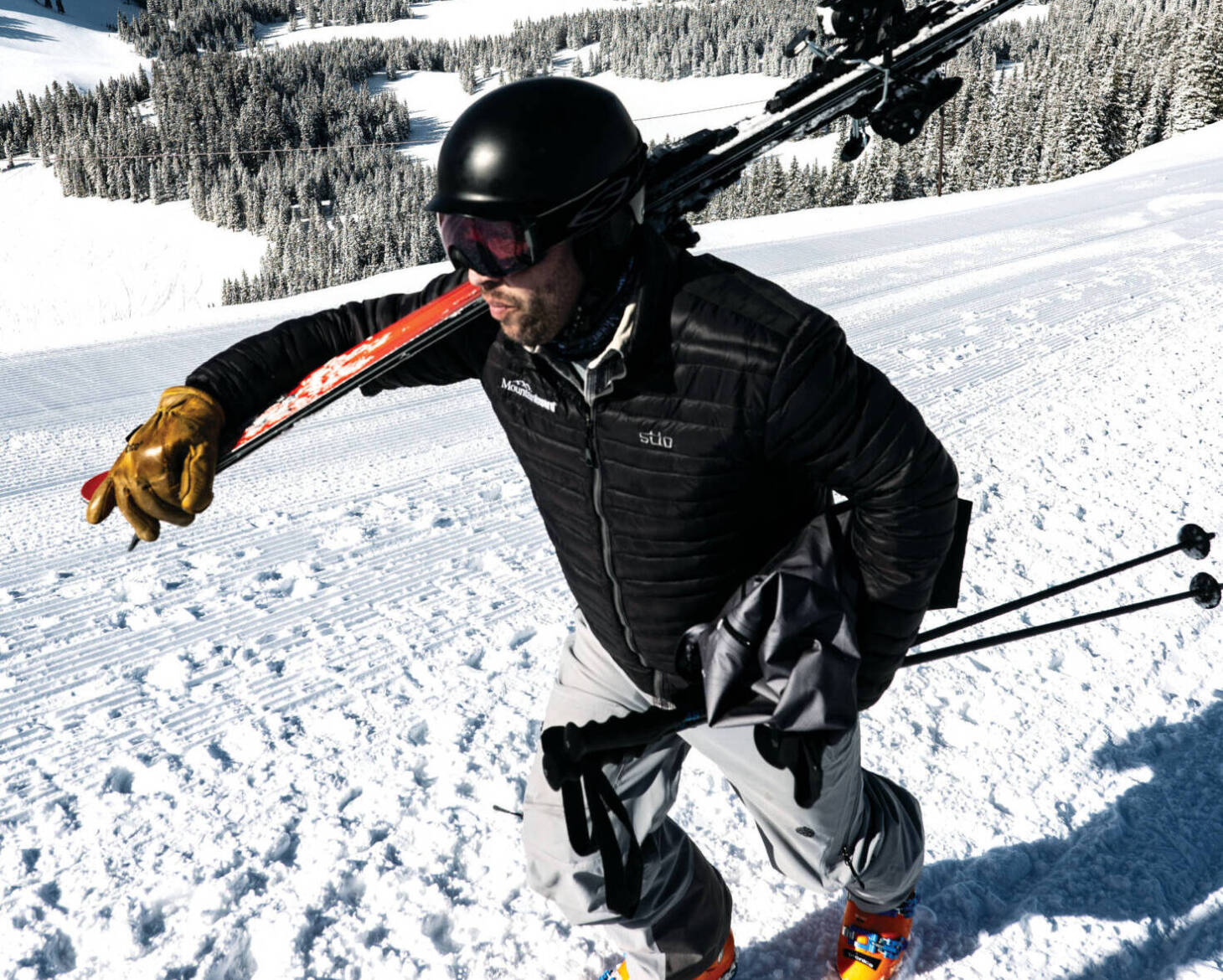 Man trekking across mountain