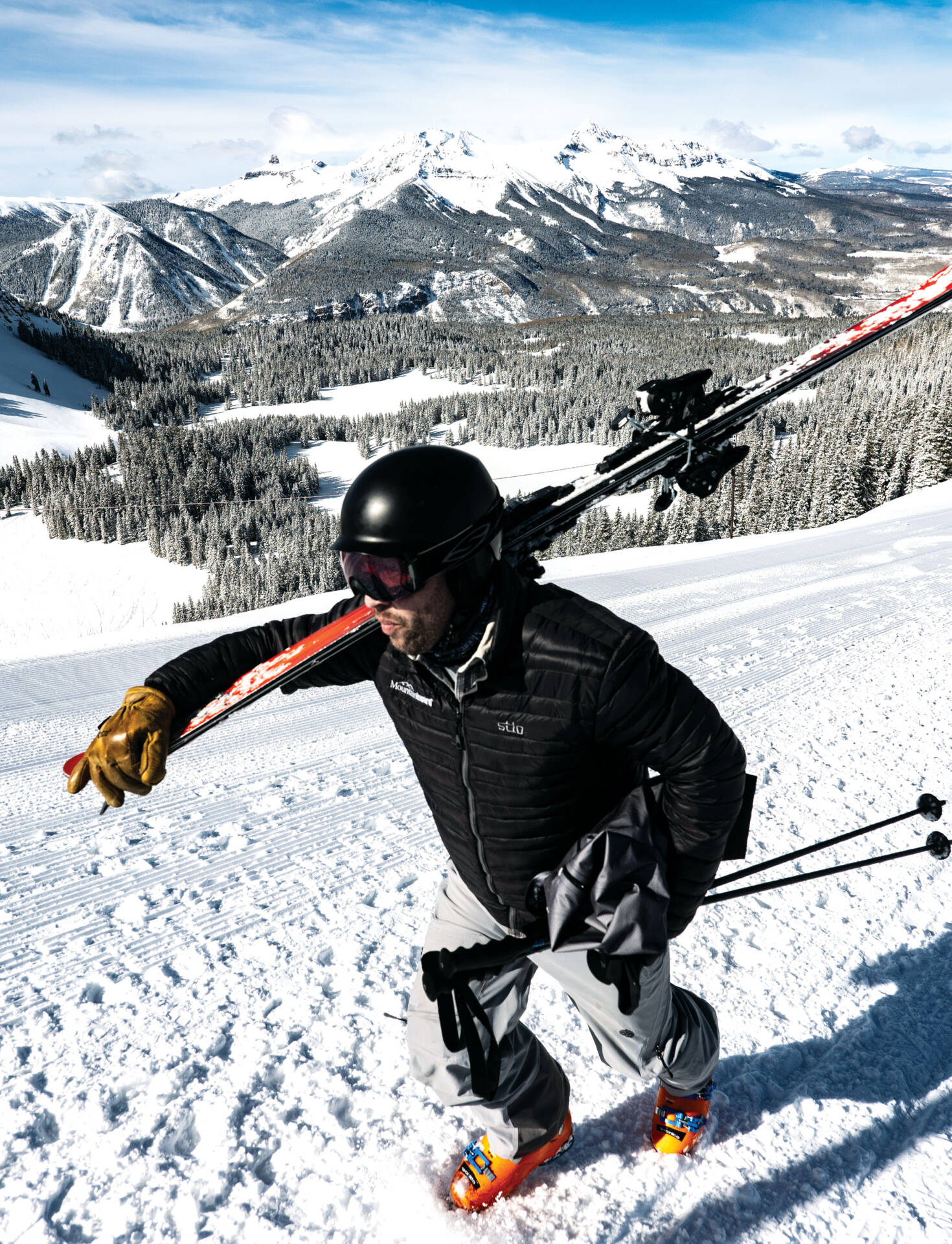 Man trekking across mountain