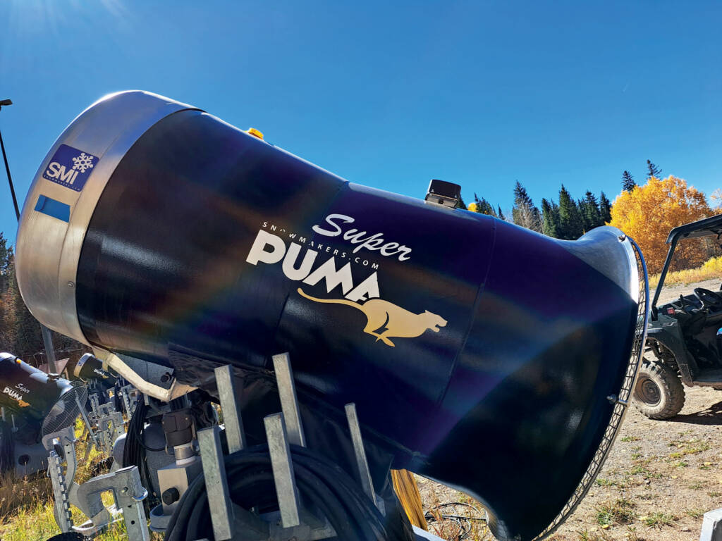 Snow gun with GPS trackers mounted on top.