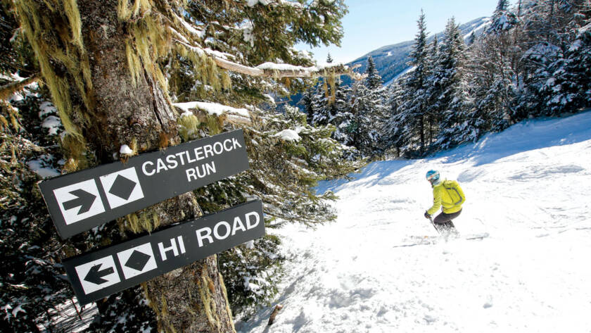 Skier heading down Castlerock Run