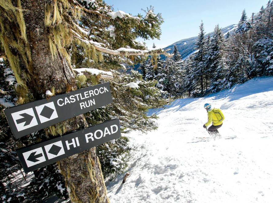 Skier heading down Castlerock Run