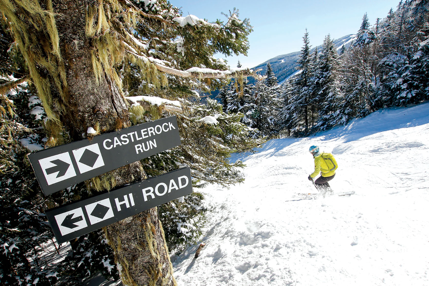 Skier heading down Castlerock Run