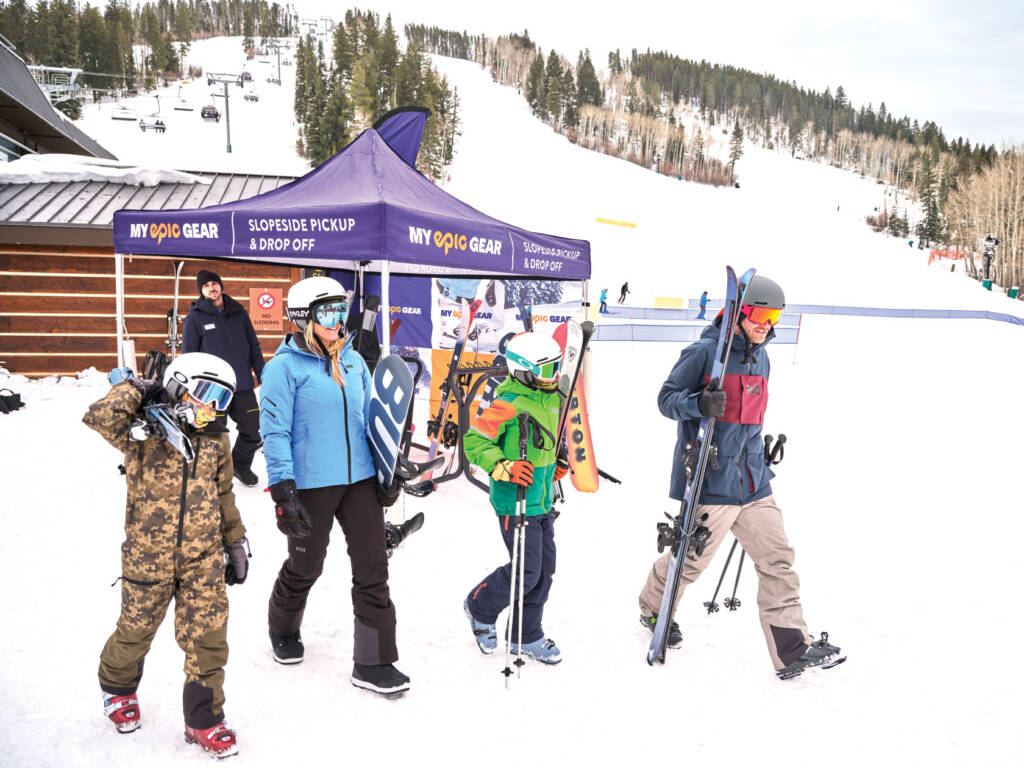 Group of skiers walking in snow