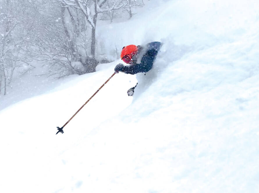 Joel Gratz skiing deep powder