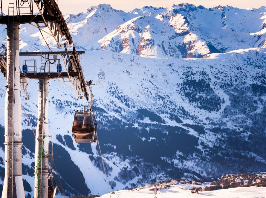Gondola lift in ski resort in Alps mountains, France