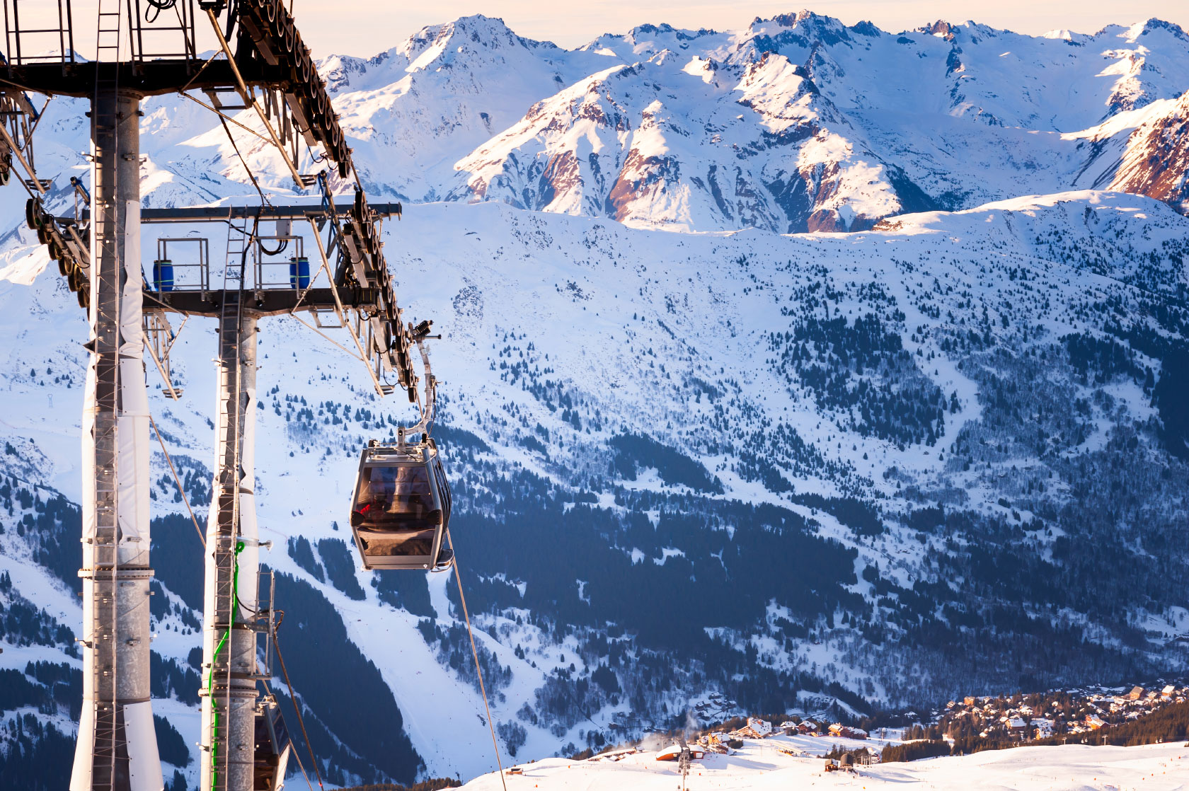 Gondola lift in ski resort in Alps mountains, France