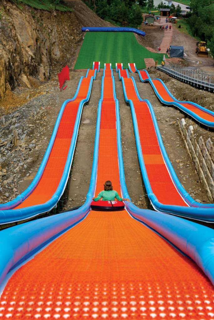 Solo rider going down summer tube track