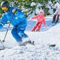 Couple with small child skiing