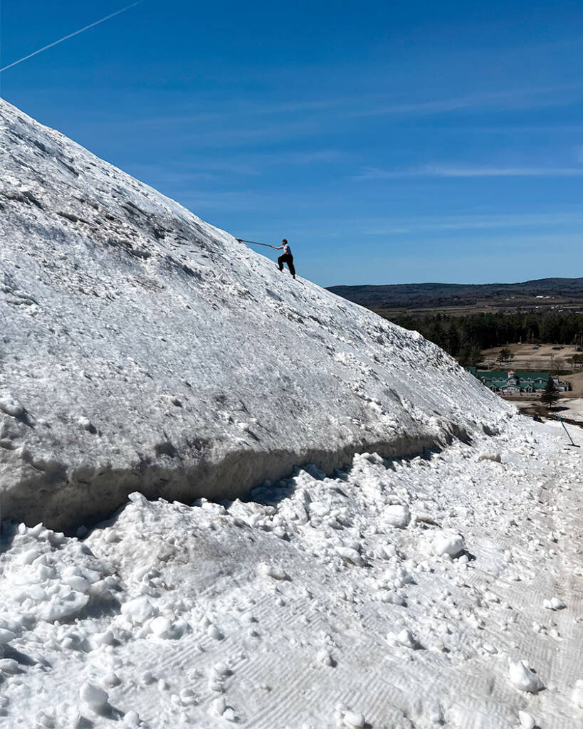 Worker on side of mountain