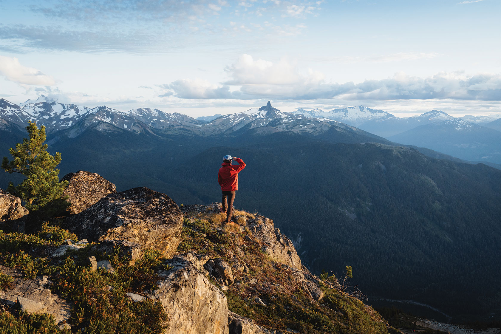 Hiker looking across mountaintops
