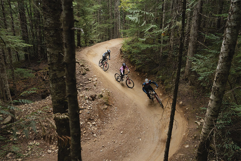 Bikers racing down trails