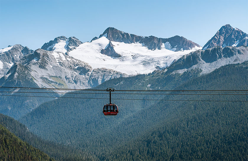 Gondola with mountains in background