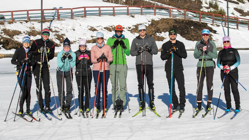 Group of skiers posing for photo