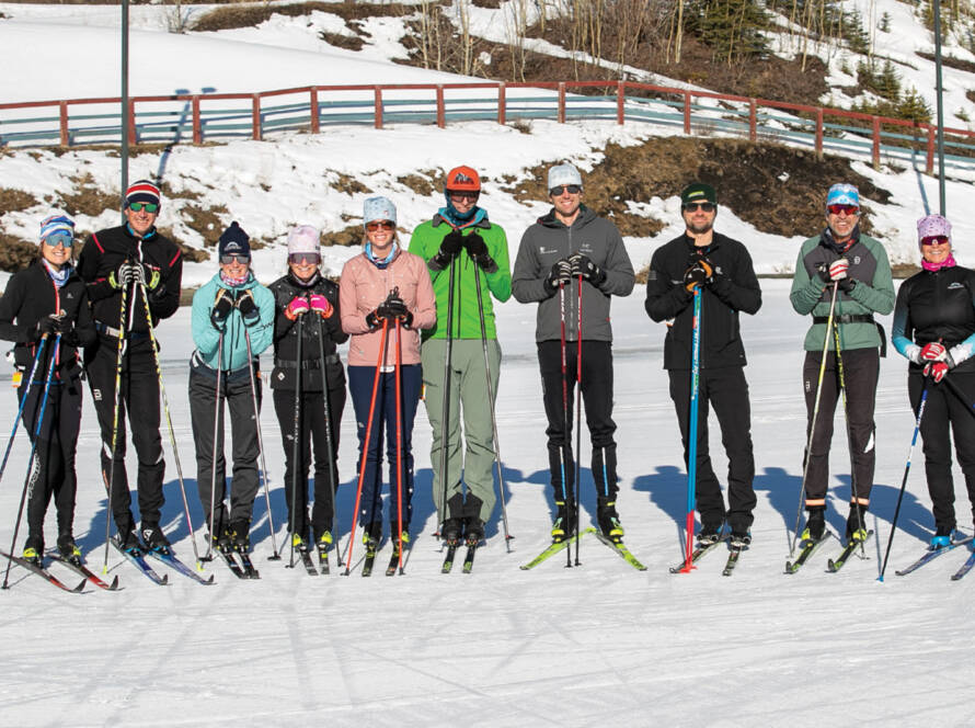 Group of skiers posing for photo