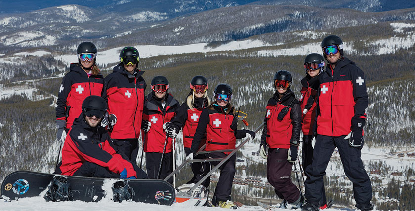 Ski patrol posing for group photo