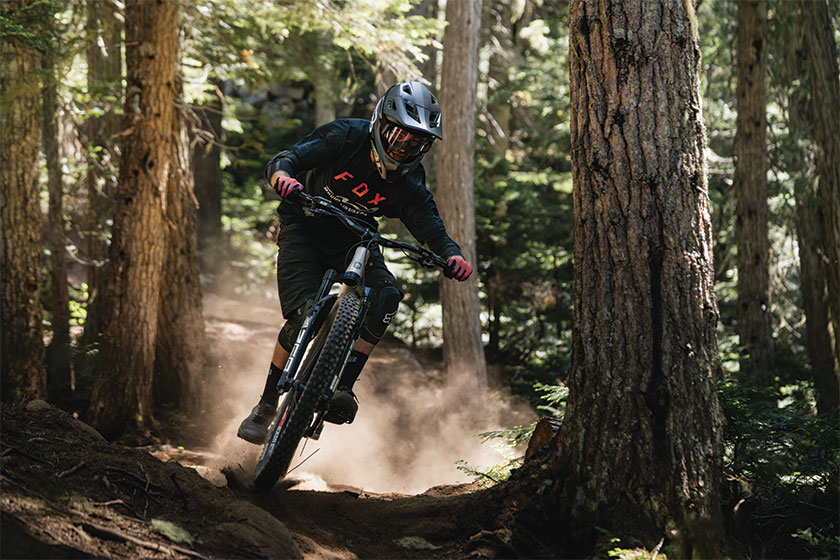 Biker racing on trail